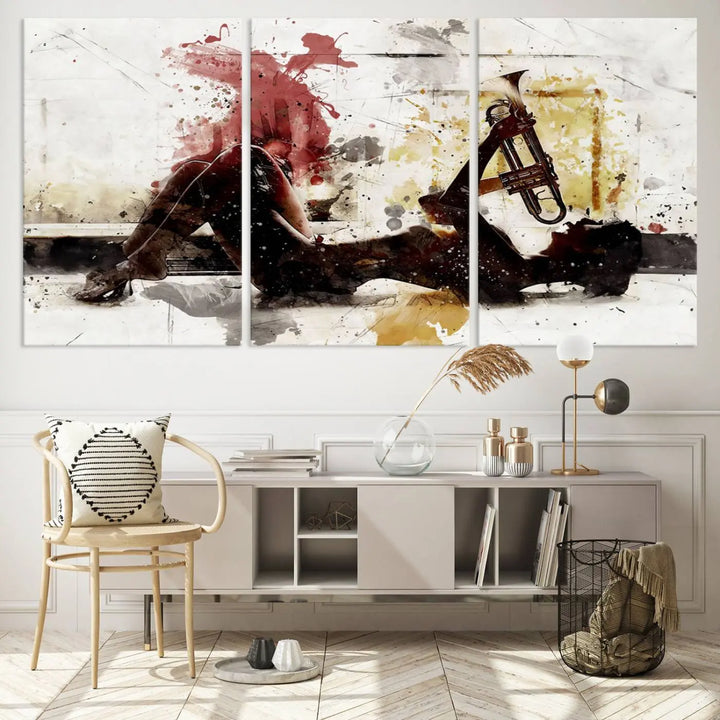 Introducing the Stylish Jazz Woman with Trumpet Triptych Canvas Art: This modern abstract wall décor features a captivating painting of a person lying with a trumpet, set against an abstract background with dynamic red and yellow splashes. This triptych artwork beautifully captures the essence of music and emotion in vibrant colors.