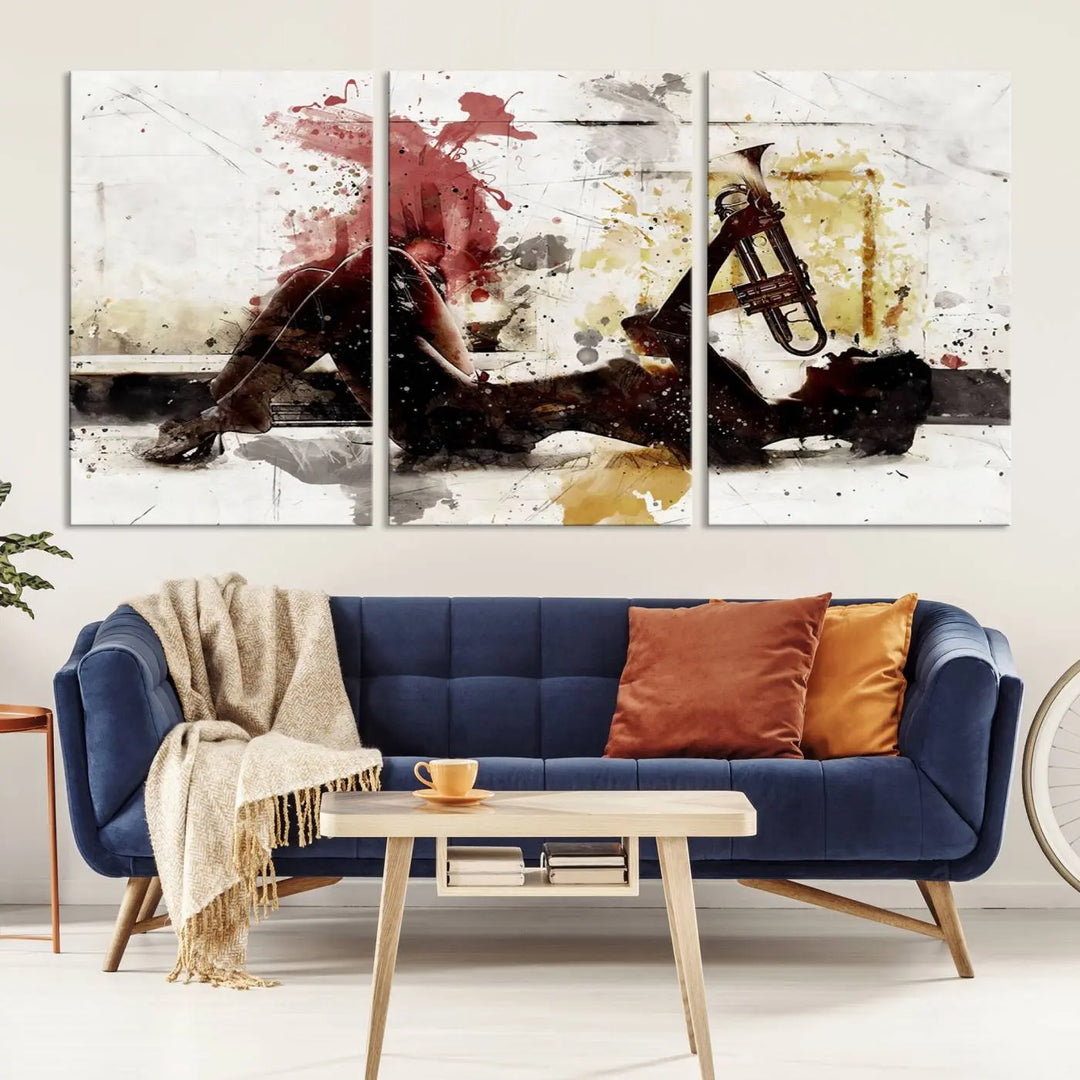 Introducing the Stylish Jazz Woman with Trumpet Triptych Canvas Art: This modern abstract wall décor features a captivating painting of a person lying with a trumpet, set against an abstract background with dynamic red and yellow splashes. This triptych artwork beautifully captures the essence of music and emotion in vibrant colors.