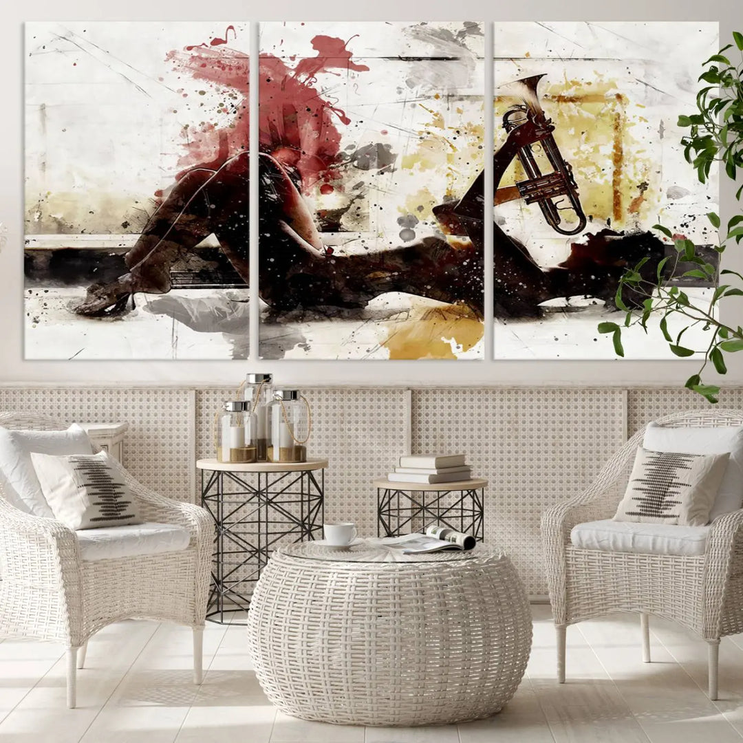 Introducing the Stylish Jazz Woman with Trumpet Triptych Canvas Art: This modern abstract wall décor features a captivating painting of a person lying with a trumpet, set against an abstract background with dynamic red and yellow splashes. This triptych artwork beautifully captures the essence of music and emotion in vibrant colors.