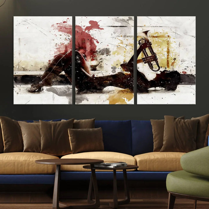 Introducing the Stylish Jazz Woman with Trumpet Triptych Canvas Art: This modern abstract wall décor features a captivating painting of a person lying with a trumpet, set against an abstract background with dynamic red and yellow splashes. This triptych artwork beautifully captures the essence of music and emotion in vibrant colors.