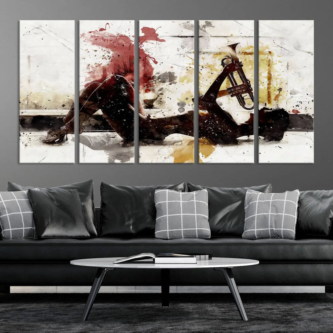 Introducing the Stylish Jazz Woman with Trumpet Triptych Canvas Art: This modern abstract wall décor features a captivating painting of a person lying with a trumpet, set against an abstract background with dynamic red and yellow splashes. This triptych artwork beautifully captures the essence of music and emotion in vibrant colors.