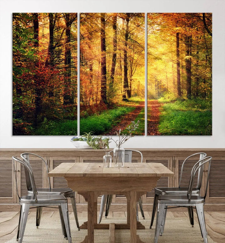 The Sunlight Through Trees Wall Art Canvas Print showcases a sunlit forest path in autumn on gallery-wrapped, museum-quality canvas with UV-protective coating.