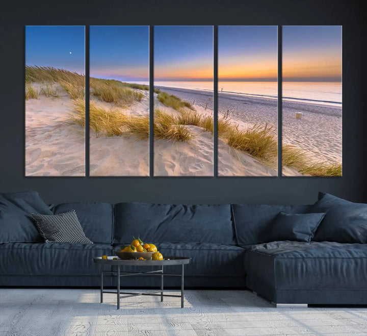 A modern living room showcases the "Sunrise On The Beach Wall Art Canvas Print" as a triptych above white cabinets. These ready-to-hang pieces are crafted on museum-quality canvas with a UV-protective coating, ensuring lasting vibrancy and elegance.