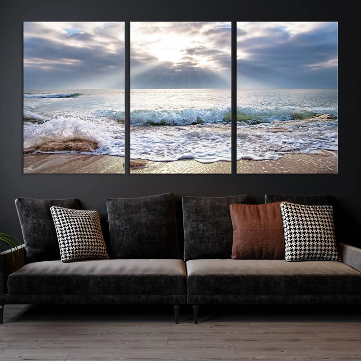 Sunset At The Beach Wall Art Canvas Print, showcasing a triptych of a tranquil ocean view with waves and sun rays, is printed on museum-quality canvas with UV-protective coating. Enjoy this artistic elegance with free shipping.