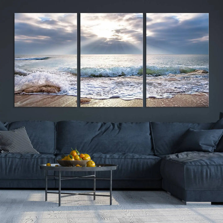 Sunset At The Beach Wall Art Canvas Print, showcasing a triptych of a tranquil ocean view with waves and sun rays, is printed on museum-quality canvas with UV-protective coating. Enjoy this artistic elegance with free shipping.