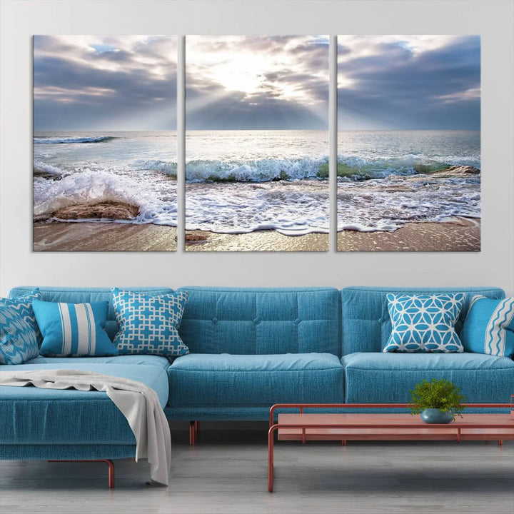 Sunset At The Beach Wall Art Canvas Print, showcasing a triptych of a tranquil ocean view with waves and sun rays, is printed on museum-quality canvas with UV-protective coating. Enjoy this artistic elegance with free shipping.