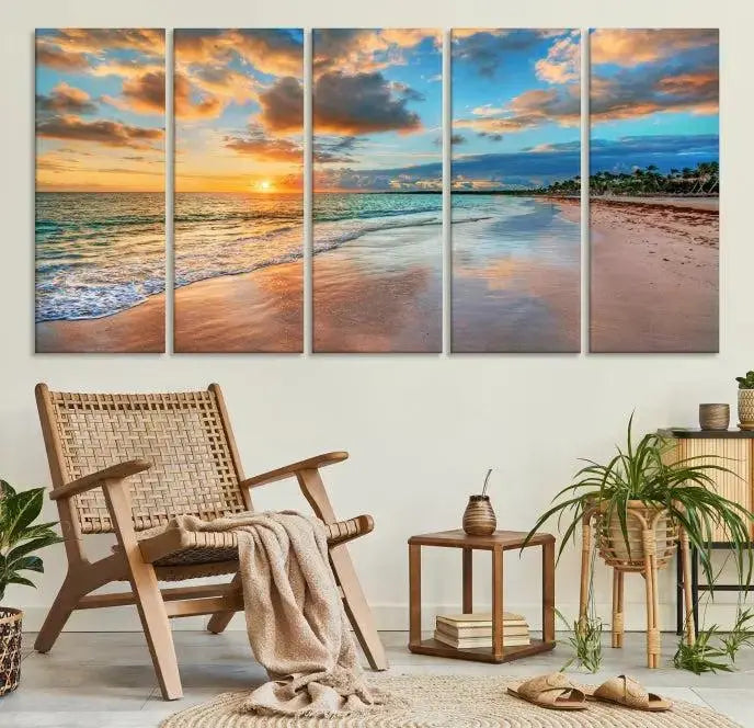 A Sunset Beach Canvas Wall Art—Tropical Triptych Seascape Print embellishes the cozy living room, enhancing the coastal ambiance with its serene ocean sunset.