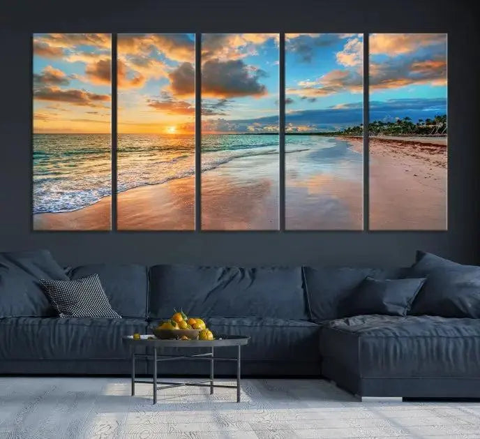 A Sunset Beach Canvas Wall Art—Tropical Triptych Seascape Print embellishes the cozy living room, enhancing the coastal ambiance with its serene ocean sunset.