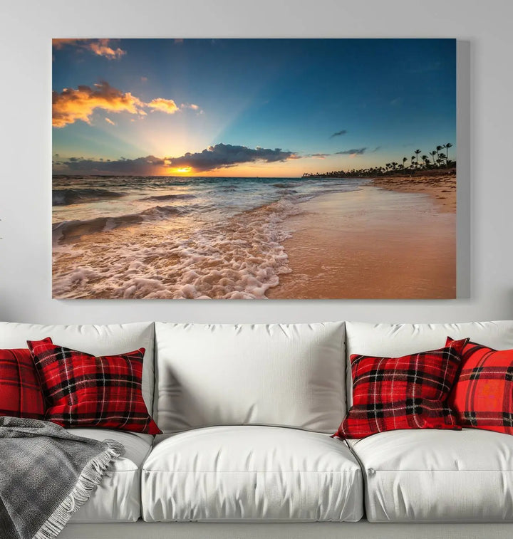 The Sunset Beach Canvas Wall Art, featuring a tropical coastal ocean view in a triptych design, beautifully captures the beach sunset with waves.