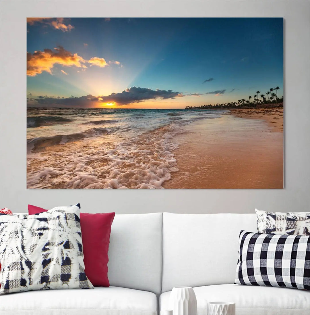 The Sunset Beach Canvas Wall Art, featuring a tropical coastal ocean view in a triptych design, beautifully captures the beach sunset with waves.