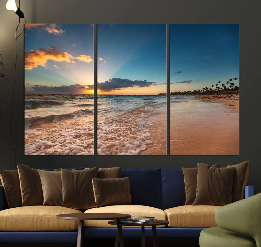 The Sunset Beach Canvas Wall Art, featuring a tropical coastal ocean view in a triptych design, beautifully captures the beach sunset with waves.