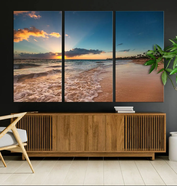 The Sunset Beach Canvas Wall Art, featuring a tropical coastal ocean view in a triptych design, beautifully captures the beach sunset with waves.