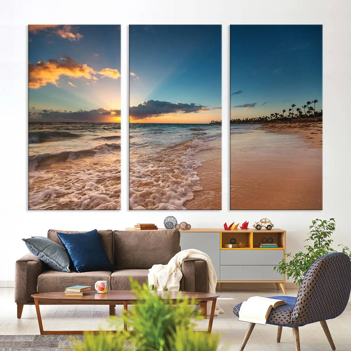 The Sunset Beach Canvas Wall Art, featuring a tropical coastal ocean view in a triptych design, beautifully captures the beach sunset with waves.