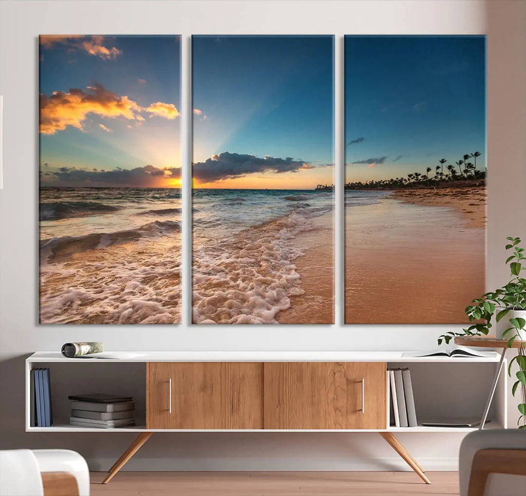 The Sunset Beach Canvas Wall Art, featuring a tropical coastal ocean view in a triptych design, beautifully captures the beach sunset with waves.