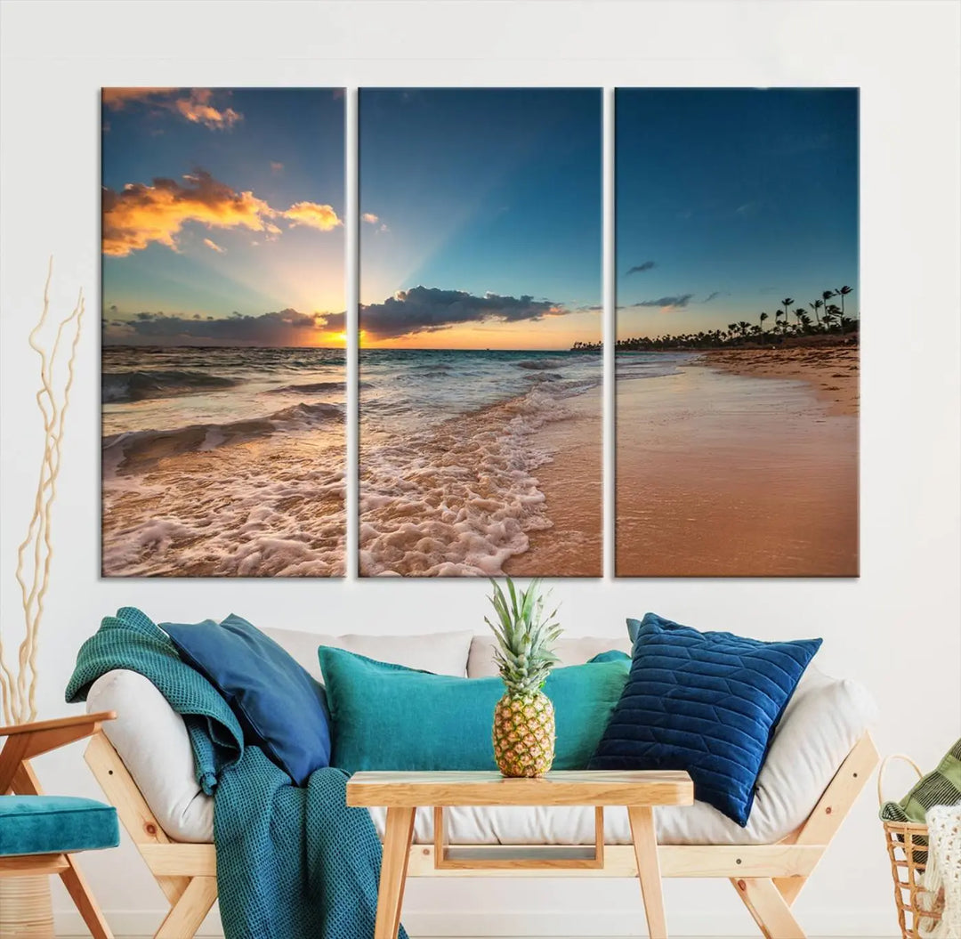 The Sunset Beach Canvas Wall Art, featuring a tropical coastal ocean view in a triptych design, beautifully captures the beach sunset with waves.