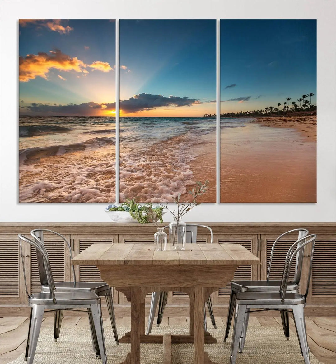 The Sunset Beach Canvas Wall Art, featuring a tropical coastal ocean view in a triptych design, beautifully captures the beach sunset with waves.