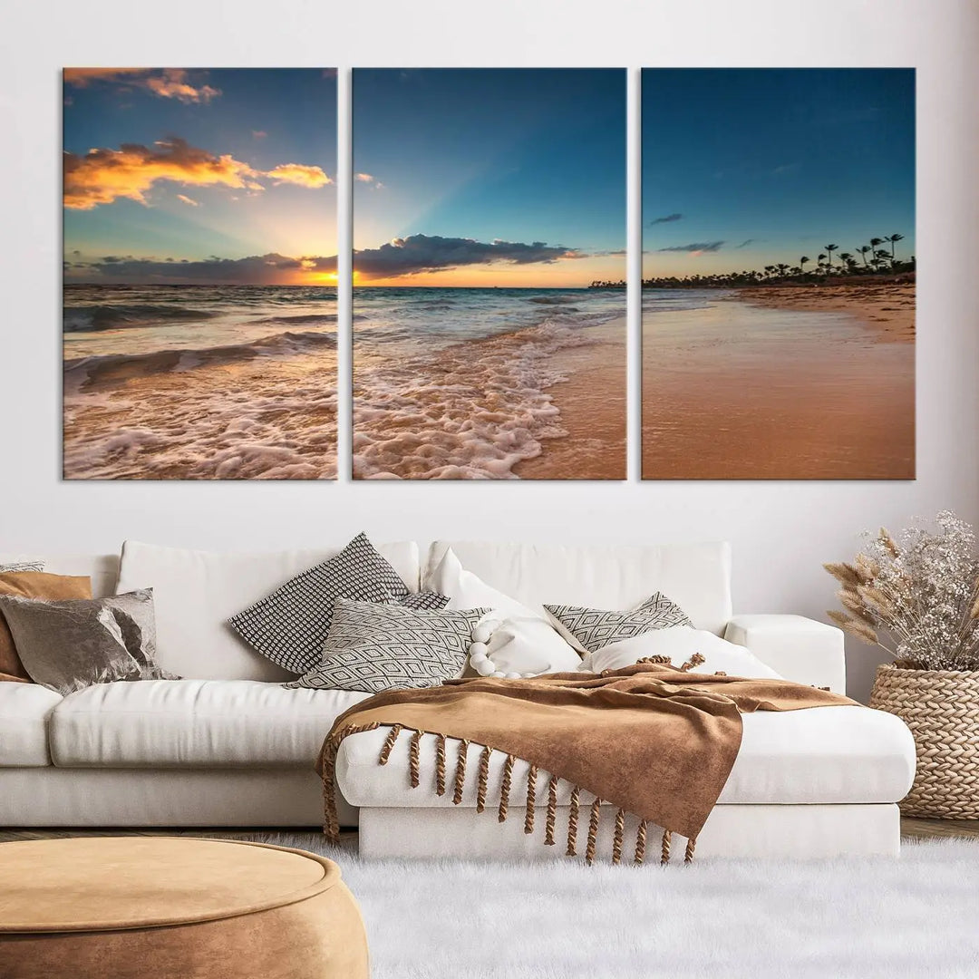 The Sunset Beach Canvas Wall Art, featuring a tropical coastal ocean view in a triptych design, beautifully captures the beach sunset with waves.