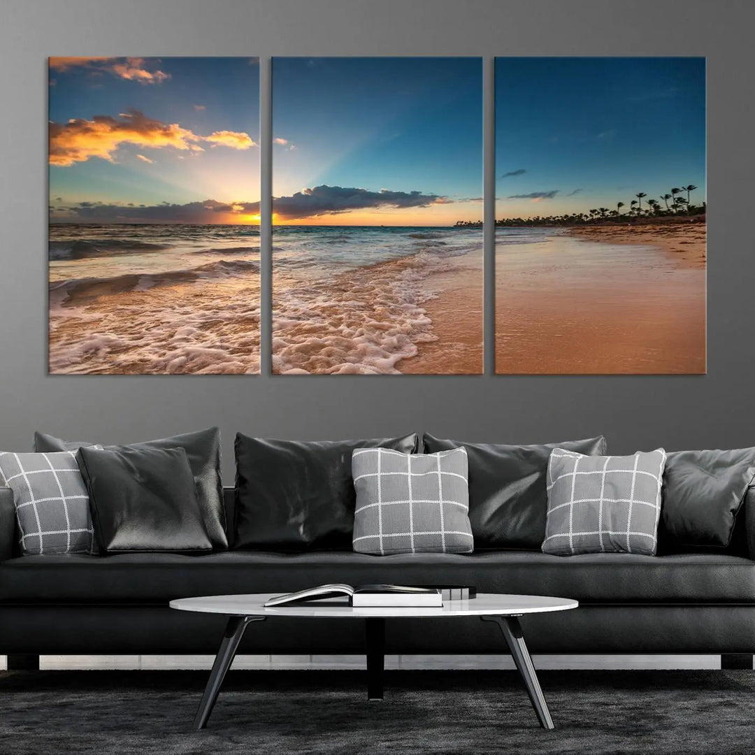 The Sunset Beach Canvas Wall Art, featuring a tropical coastal ocean view in a triptych design, beautifully captures the beach sunset with waves.