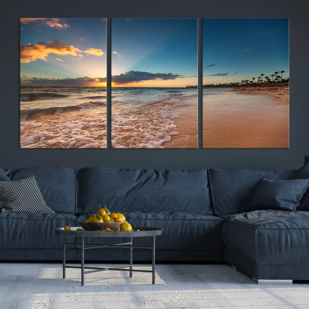 The Sunset Beach Canvas Wall Art, featuring a tropical coastal ocean view in a triptych design, beautifully captures the beach sunset with waves.