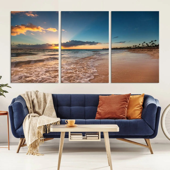 The Sunset Beach Canvas Wall Art, featuring a tropical coastal ocean view in a triptych design, beautifully captures the beach sunset with waves.