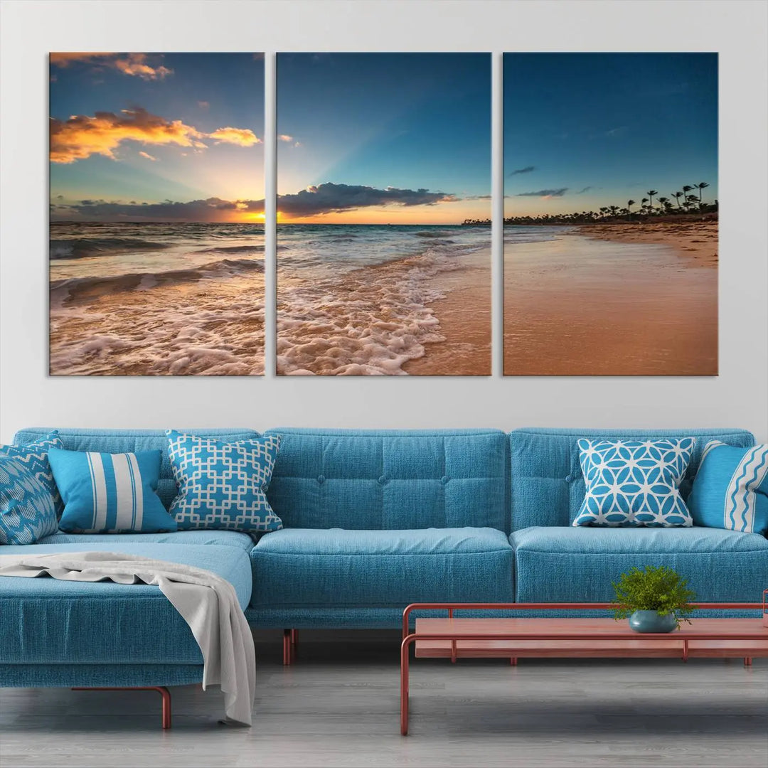 The Sunset Beach Canvas Wall Art, featuring a tropical coastal ocean view in a triptych design, beautifully captures the beach sunset with waves.