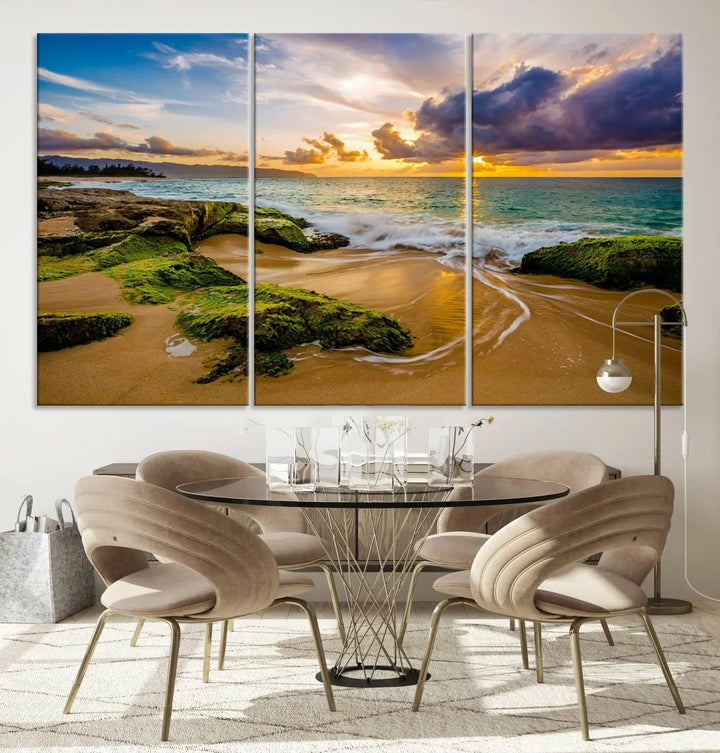 The Sunset Beach Wall Art Canvas Print is a gallery-wrapped triptych showcasing a beach scene with mossy rocks and a vibrant sunset. Made from museum-quality canvas and featuring a UV-protective coating, it elegantly provides both beauty and durability.