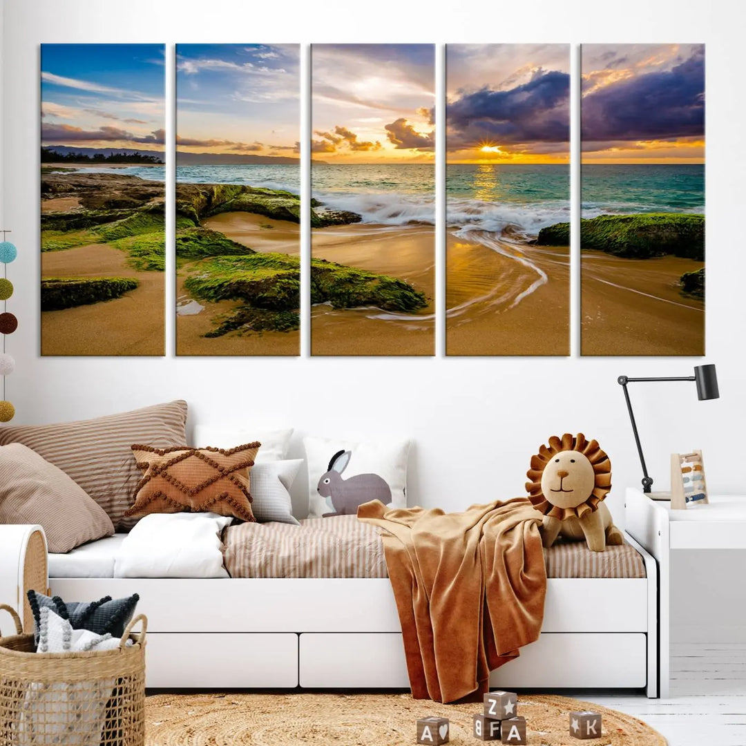 The Sunset Beach Wall Art Canvas Print is a gallery-wrapped triptych showcasing a beach scene with mossy rocks and a vibrant sunset. Made from museum-quality canvas and featuring a UV-protective coating, it elegantly provides both beauty and durability.