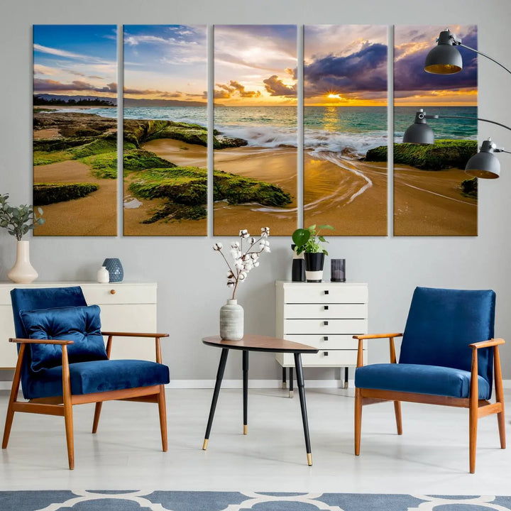 The Sunset Beach Wall Art Canvas Print is a gallery-wrapped triptych showcasing a beach scene with mossy rocks and a vibrant sunset. Made from museum-quality canvas and featuring a UV-protective coating, it elegantly provides both beauty and durability.