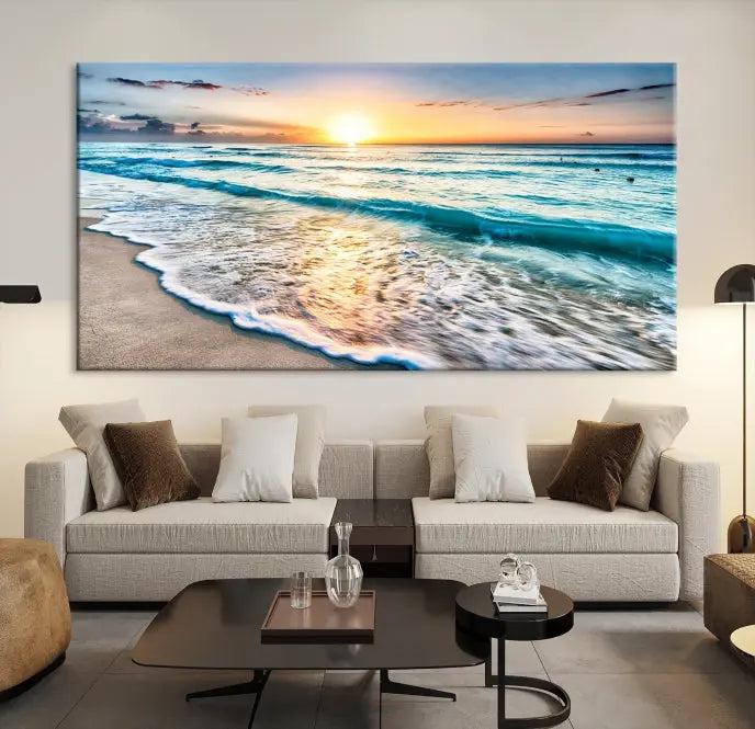 The living room features the Sunset Beach Waves Canvas Wall Art—an ocean sunset print spread over five panels that enhance your space with coastal decor. Cozy, nature-themed elements add warmth and charm to the ambiance.