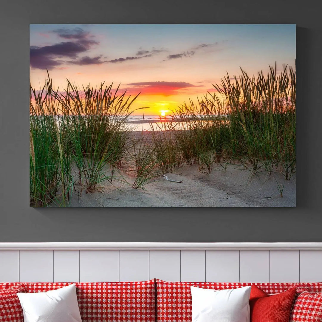 A set of three "Sunset Coastal Beach Wall Art Canvas Prints," featuring a beach sunset with tall grasses, gallery wrapped on museum-quality canvases.