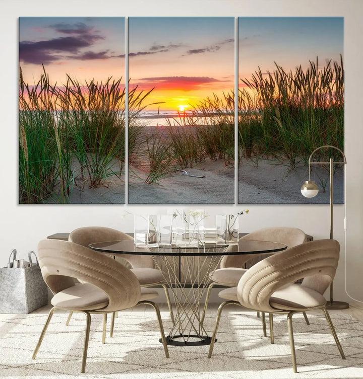 A set of three "Sunset Coastal Beach Wall Art Canvas Prints," featuring a beach sunset with tall grasses, gallery wrapped on museum-quality canvases.