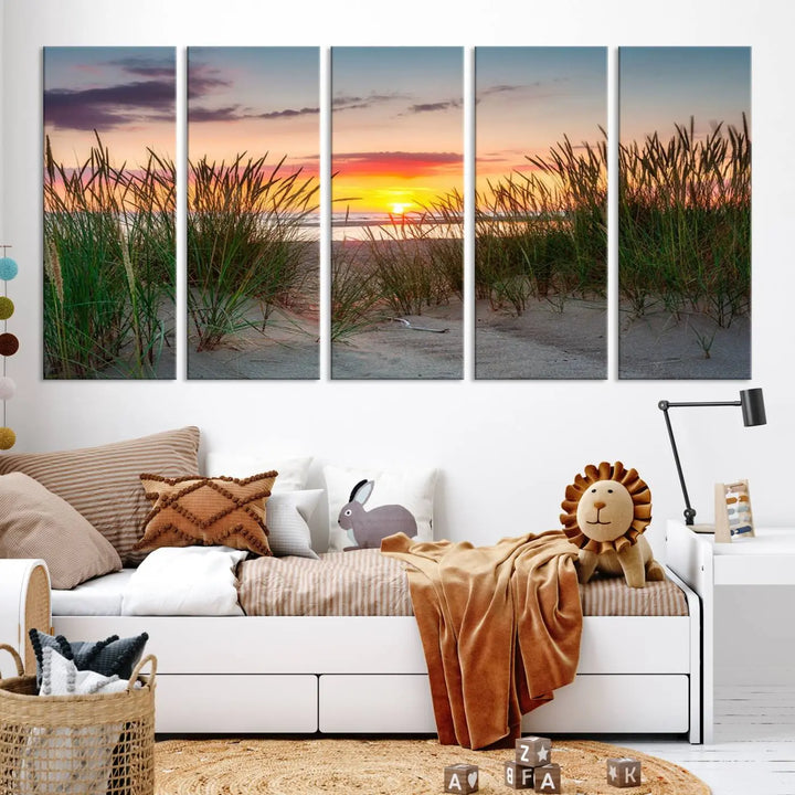 A set of three "Sunset Coastal Beach Wall Art Canvas Prints," featuring a beach sunset with tall grasses, gallery wrapped on museum-quality canvases.