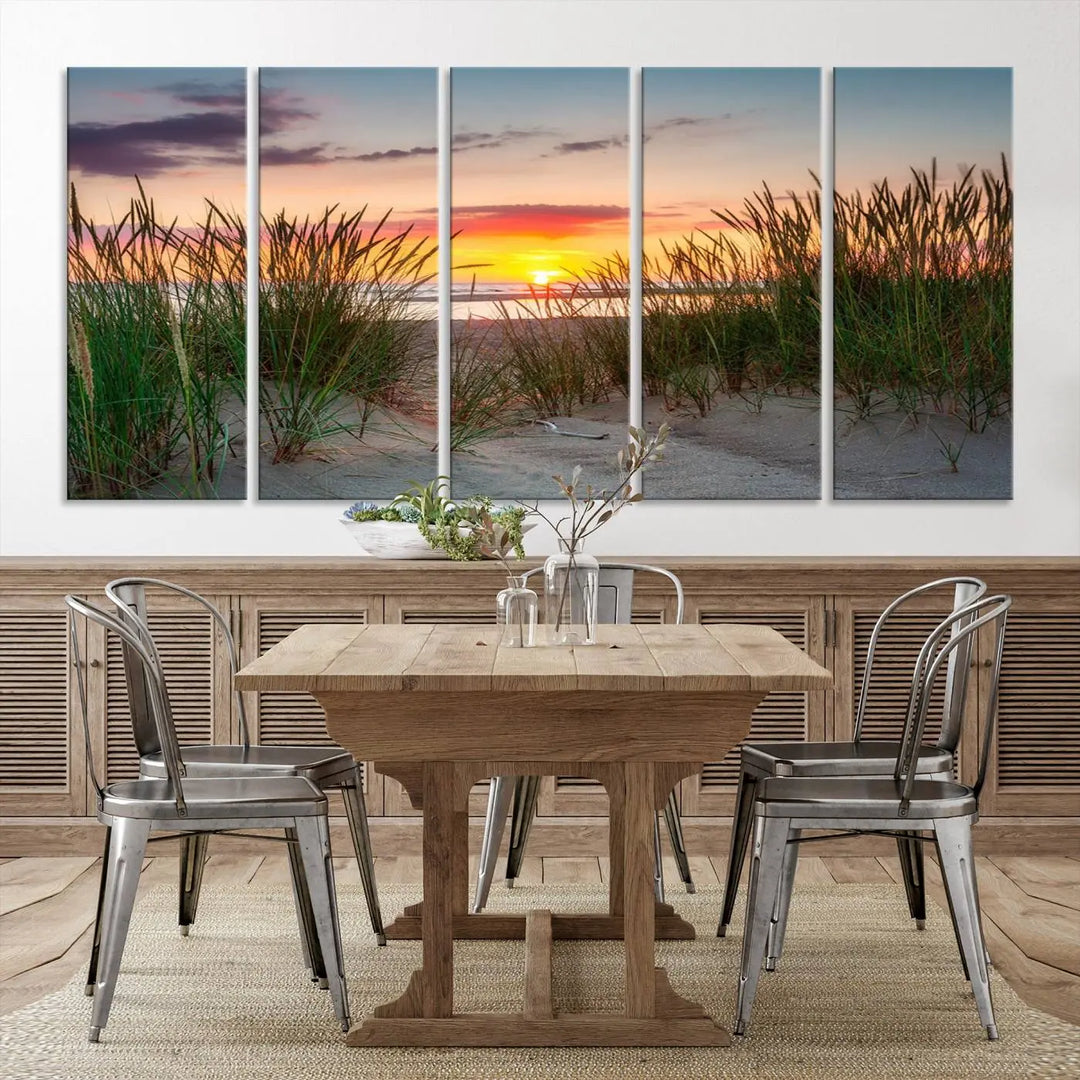 A set of three "Sunset Coastal Beach Wall Art Canvas Prints," featuring a beach sunset with tall grasses, gallery wrapped on museum-quality canvases.