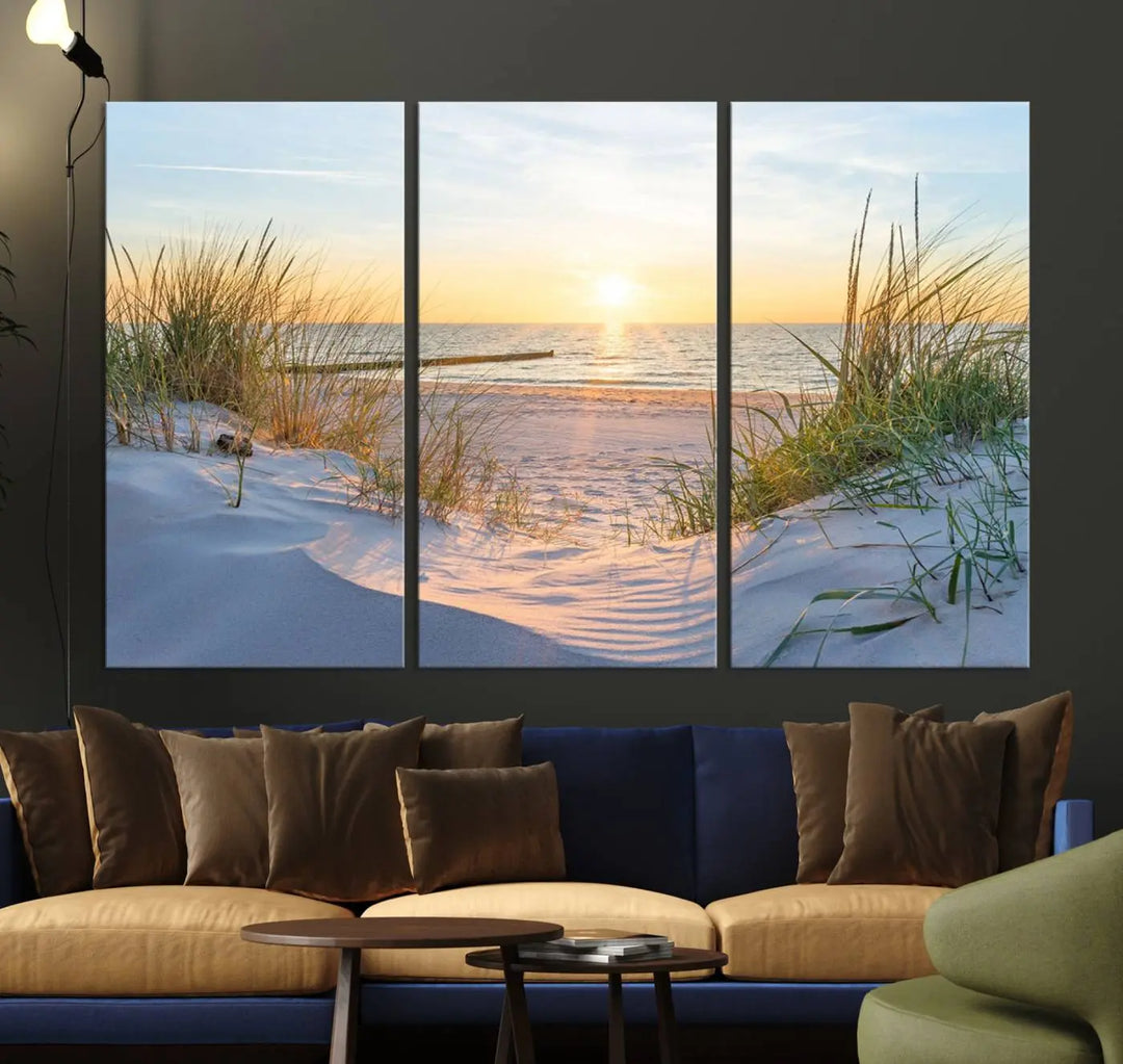 The Sunset Ocean View Beach Canvas Print Artwork, consisting of three panels depicting a tranquil beach sunset, is printed on museum-quality canvas with a UV-protective coating. Free shipping is available for an effortlessly elegant home transformation.