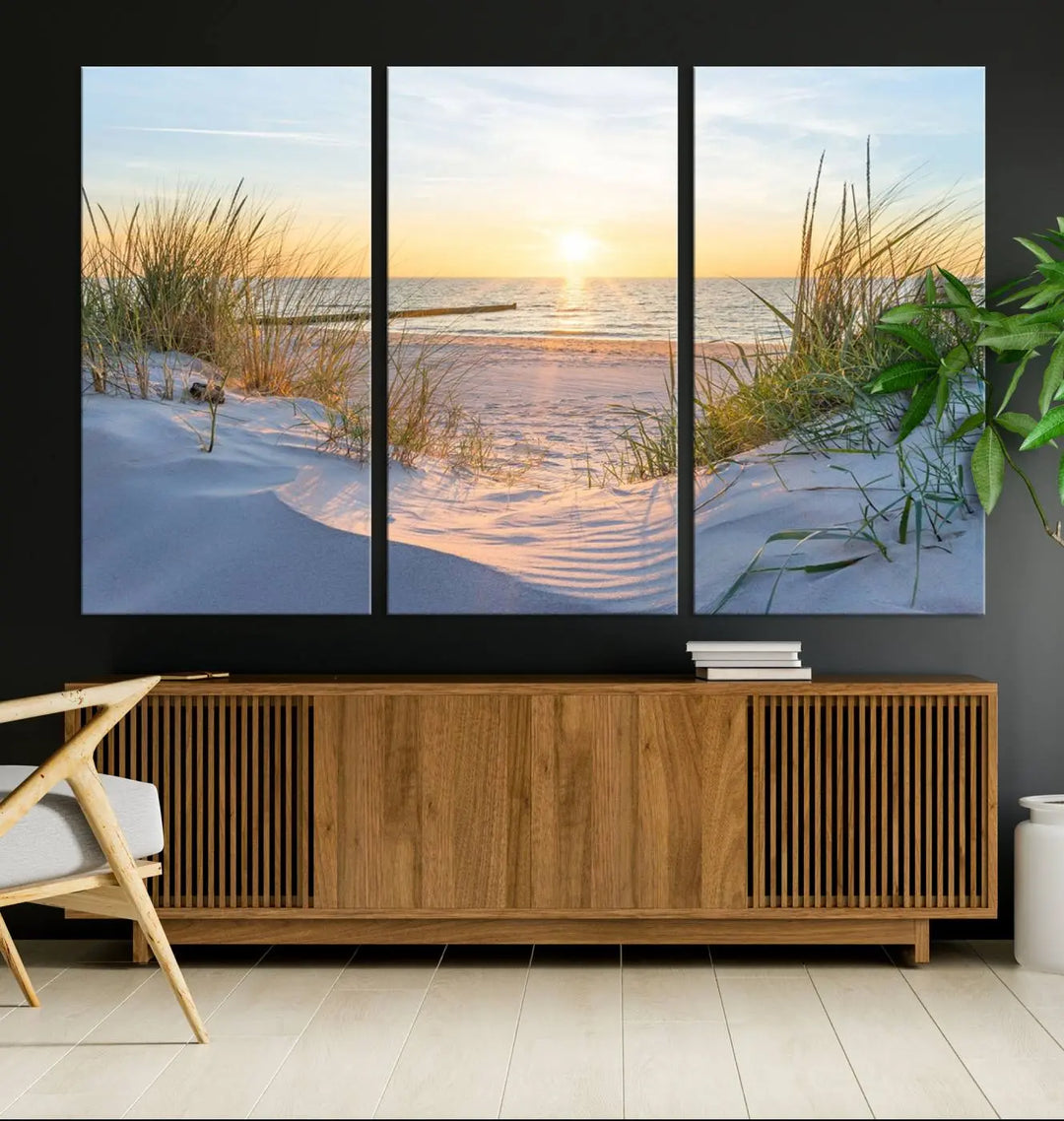 The Sunset Ocean View Beach Canvas Print Artwork, consisting of three panels depicting a tranquil beach sunset, is printed on museum-quality canvas with a UV-protective coating. Free shipping is available for an effortlessly elegant home transformation.