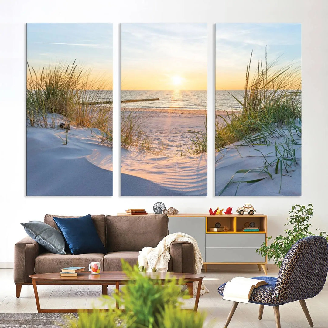 The Sunset Ocean View Beach Canvas Print Artwork, consisting of three panels depicting a tranquil beach sunset, is printed on museum-quality canvas with a UV-protective coating. Free shipping is available for an effortlessly elegant home transformation.