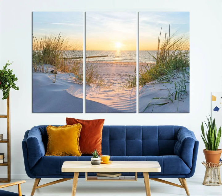 The Sunset Ocean View Beach Canvas Print Artwork, consisting of three panels depicting a tranquil beach sunset, is printed on museum-quality canvas with a UV-protective coating. Free shipping is available for an effortlessly elegant home transformation.