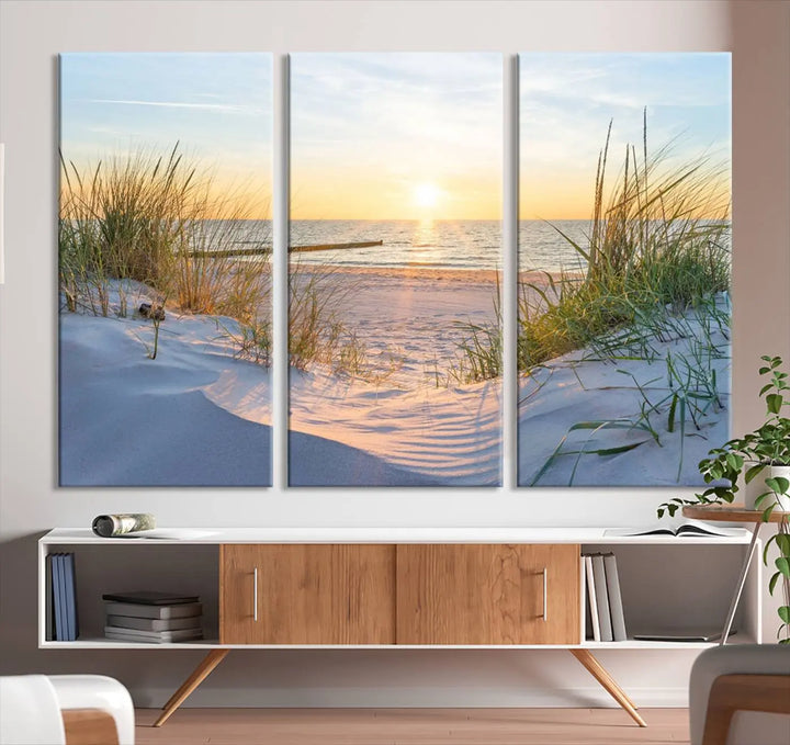 The Sunset Ocean View Beach Canvas Print Artwork, consisting of three panels depicting a tranquil beach sunset, is printed on museum-quality canvas with a UV-protective coating. Free shipping is available for an effortlessly elegant home transformation.