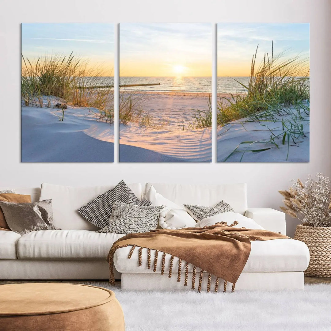 The Sunset Ocean View Beach Canvas Print Artwork, consisting of three panels depicting a tranquil beach sunset, is printed on museum-quality canvas with a UV-protective coating. Free shipping is available for an effortlessly elegant home transformation.