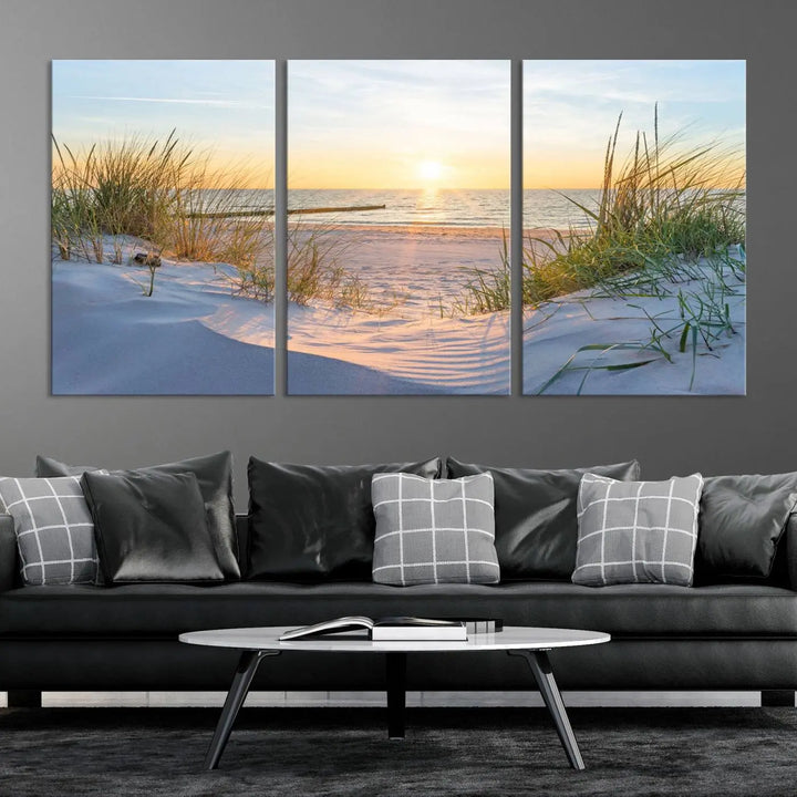 The Sunset Ocean View Beach Canvas Print Artwork, consisting of three panels depicting a tranquil beach sunset, is printed on museum-quality canvas with a UV-protective coating. Free shipping is available for an effortlessly elegant home transformation.