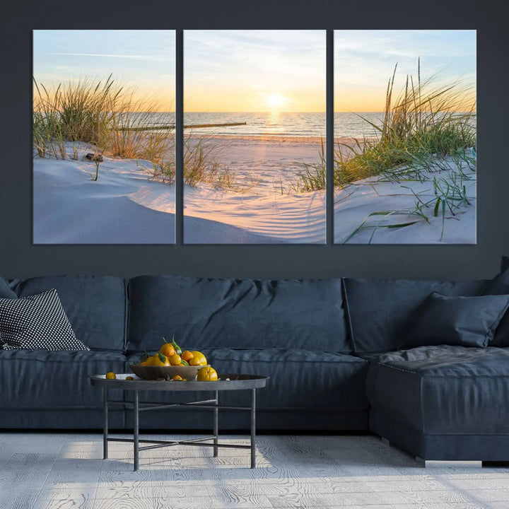 The Sunset Ocean View Beach Canvas Print Artwork, consisting of three panels depicting a tranquil beach sunset, is printed on museum-quality canvas with a UV-protective coating. Free shipping is available for an effortlessly elegant home transformation.