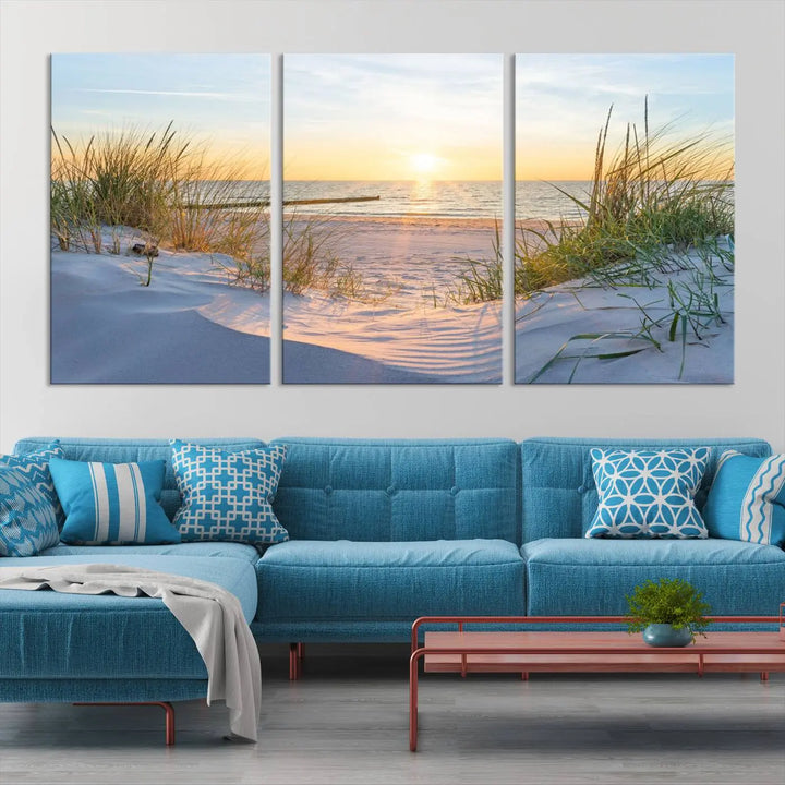 The Sunset Ocean View Beach Canvas Print Artwork, consisting of three panels depicting a tranquil beach sunset, is printed on museum-quality canvas with a UV-protective coating. Free shipping is available for an effortlessly elegant home transformation.