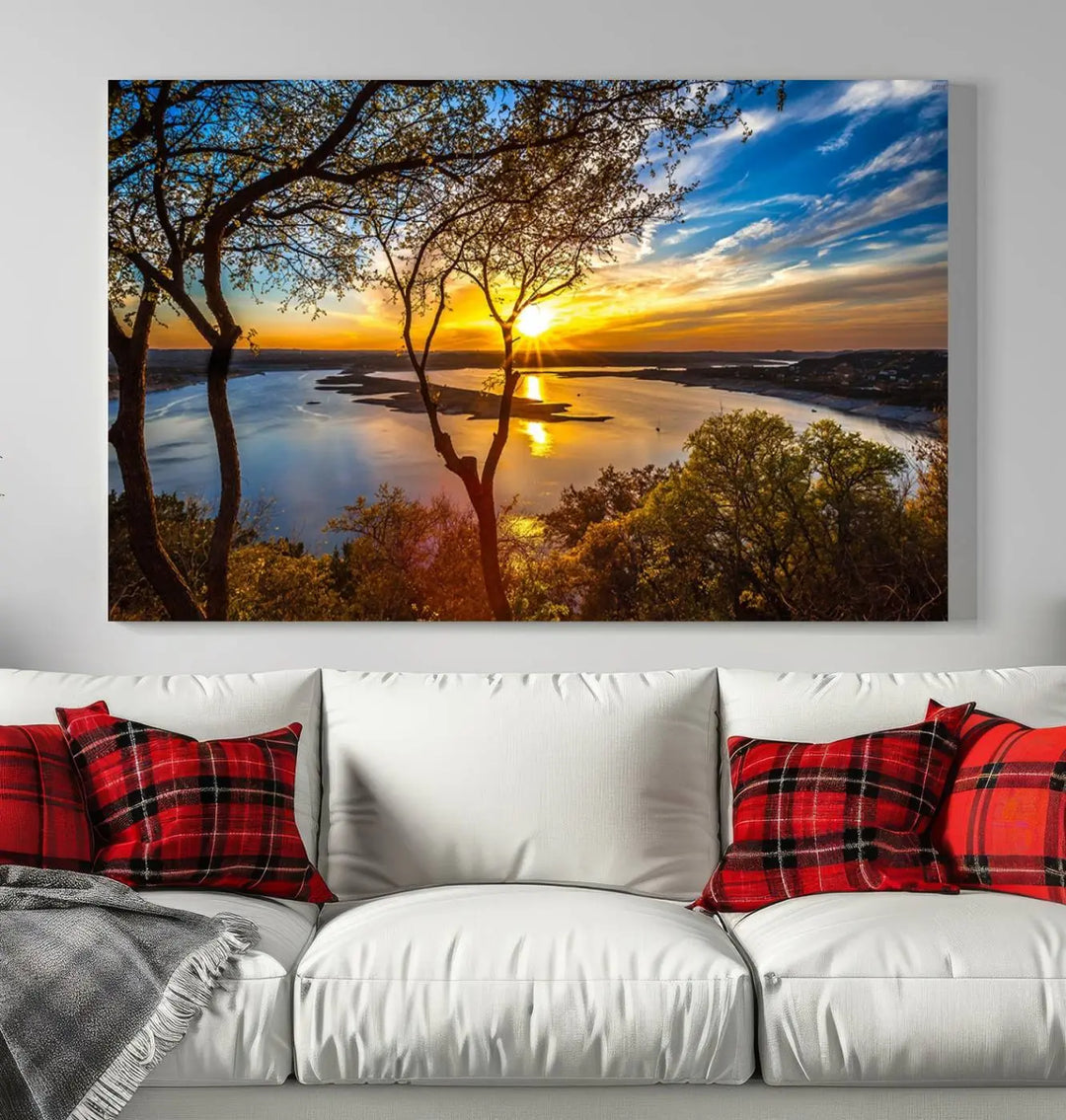 The "Sunset On The Lake Wall Art Canvas Print," featuring a vibrant sunset over a lake, is expertly crafted on museum-quality canvas and comes ready to hang. Its UV-protective coating ensures the colors stay as vivid as when they were first framed.