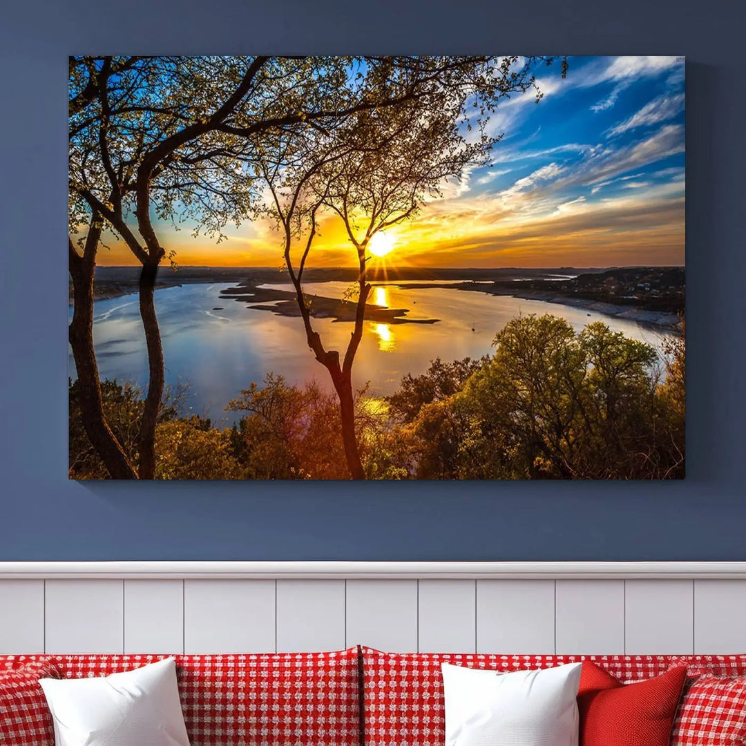 The "Sunset On The Lake Wall Art Canvas Print," featuring a vibrant sunset over a lake, is expertly crafted on museum-quality canvas and comes ready to hang. Its UV-protective coating ensures the colors stay as vivid as when they were first framed.