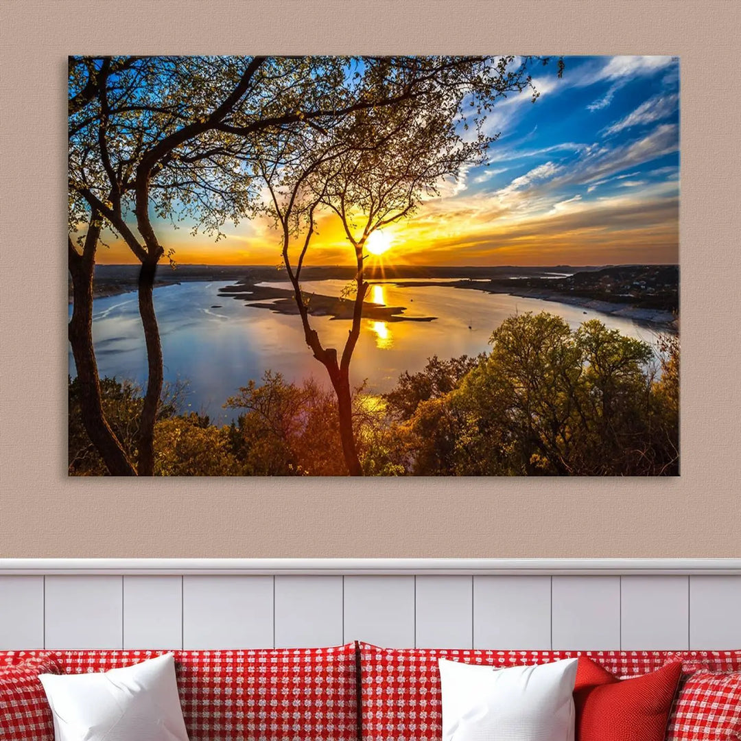 The "Sunset On The Lake Wall Art Canvas Print," featuring a vibrant sunset over a lake, is expertly crafted on museum-quality canvas and comes ready to hang. Its UV-protective coating ensures the colors stay as vivid as when they were first framed.