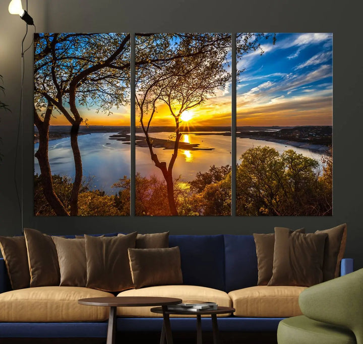 The "Sunset On The Lake Wall Art Canvas Print," featuring a vibrant sunset over a lake, is expertly crafted on museum-quality canvas and comes ready to hang. Its UV-protective coating ensures the colors stay as vivid as when they were first framed.