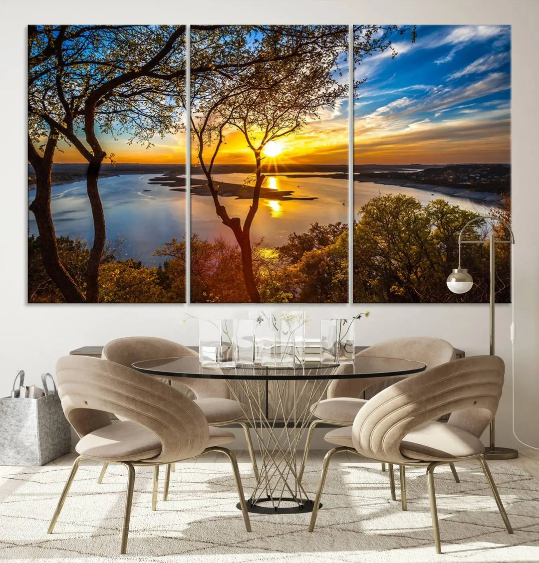 The "Sunset On The Lake Wall Art Canvas Print," featuring a vibrant sunset over a lake, is expertly crafted on museum-quality canvas and comes ready to hang. Its UV-protective coating ensures the colors stay as vivid as when they were first framed.