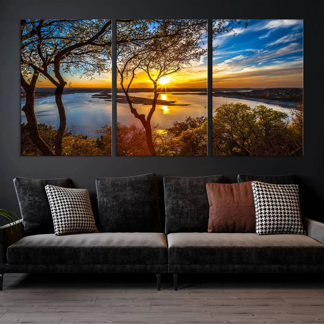 The "Sunset On The Lake Wall Art Canvas Print," featuring a vibrant sunset over a lake, is expertly crafted on museum-quality canvas and comes ready to hang. Its UV-protective coating ensures the colors stay as vivid as when they were first framed.