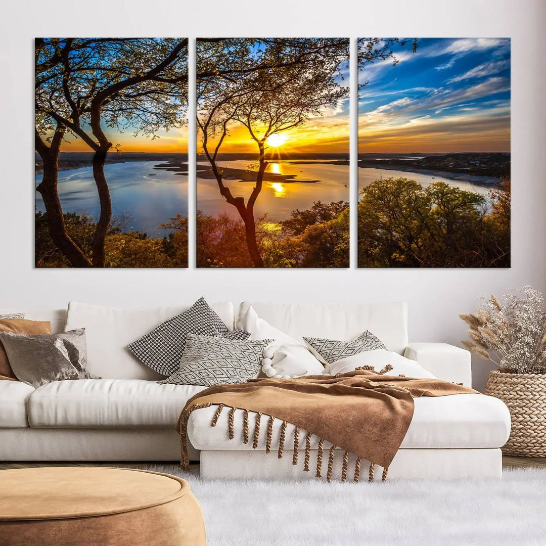 The "Sunset On The Lake Wall Art Canvas Print," featuring a vibrant sunset over a lake, is expertly crafted on museum-quality canvas and comes ready to hang. Its UV-protective coating ensures the colors stay as vivid as when they were first framed.