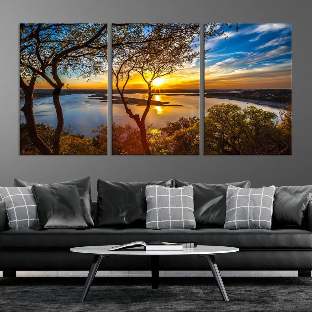 The "Sunset On The Lake Wall Art Canvas Print," featuring a vibrant sunset over a lake, is expertly crafted on museum-quality canvas and comes ready to hang. Its UV-protective coating ensures the colors stay as vivid as when they were first framed.